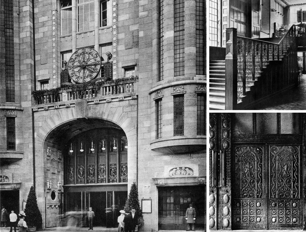 This black-and-white photograph showcases the grand entrance of an Art Deco building, featuring a striking clock above the archway. The building's façade boasts ornate details, including an intricate design adorning its front door. The archway is elegantly arched and adorned with potted plants along its ledge. A large clock, situated atop the archway, adds to the building's imposing presence. The image also captures a glimpse of the interior, revealing a staircase leading up to the next level. The photograph was likely taken in the early 20th century, capturing a moment of elegance and sophistication that defined the era.