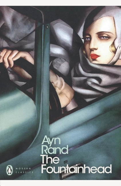 The image is a book cover for "The Fountainhead" by Ayn Rand, featuring a woman in a car with a gray scarf and red lipstick. The purpose of the image is to showcase the novel's title and author. * A woman: + Wearing a gray scarf + Has red lipstick on + Sitting in a car * A car: + Light blue color + Interior visible through the window * Text: + "Ayn Rand" written in large font at the bottom left + "The Fountainhead" written in smaller font below the author's name The image effectively conveys the novel's themes of individualism and independence, as well as its focus on a strong female protagonist. The use of a light blue car and gray scarf adds a touch of elegance and sophistication to the overall design.